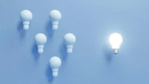 AI Debt Collection — light bulbs representing automated multi-channel outreach selection for debt recovery